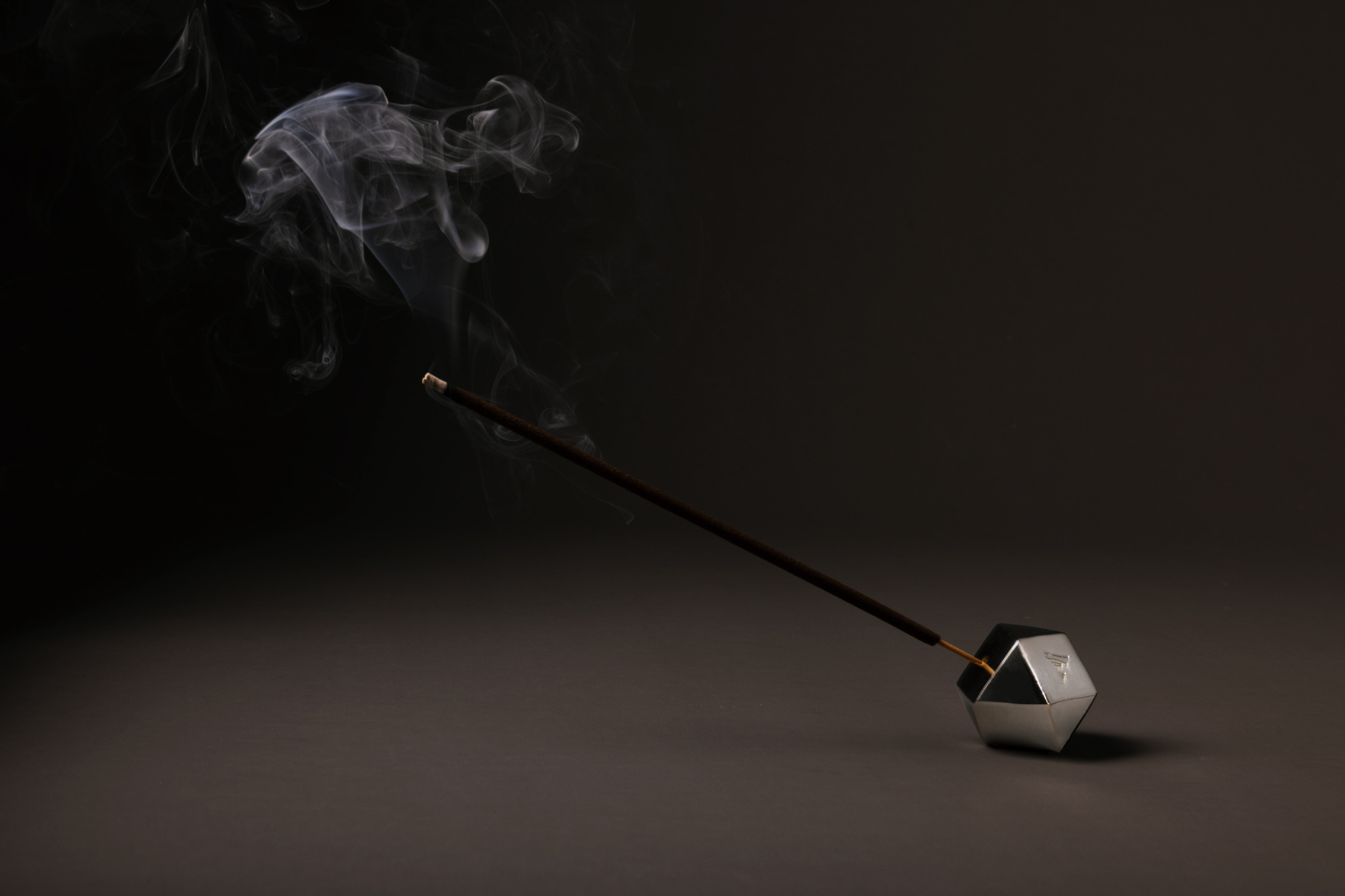 Incense burner made of aluminum with nickel  plating for high shine finish packed in a magnetic click top box with a foam insert.