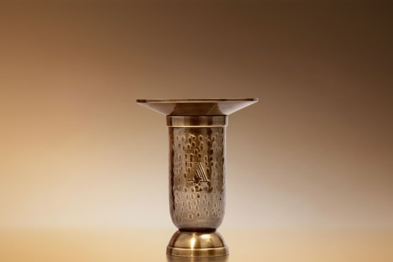 Hand-hammered solid brass incense holder for natural incense sticks.