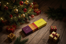 Load image into Gallery viewer, Holiday gift display under tree
