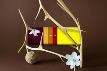 Load image into Gallery viewer, Product display with antlers and flowers
