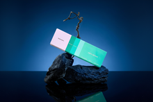 Load image into Gallery viewer, Product on rock
